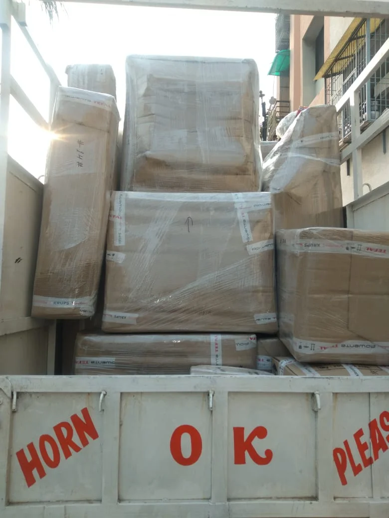 Secured Transit Vehicle with Safety Netting - Jalsa Packers & Movers Vadodara